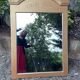 Golden mirror with wheat decoration