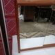 Small wall-mounted bathroom cabinet with vintage mirror doors