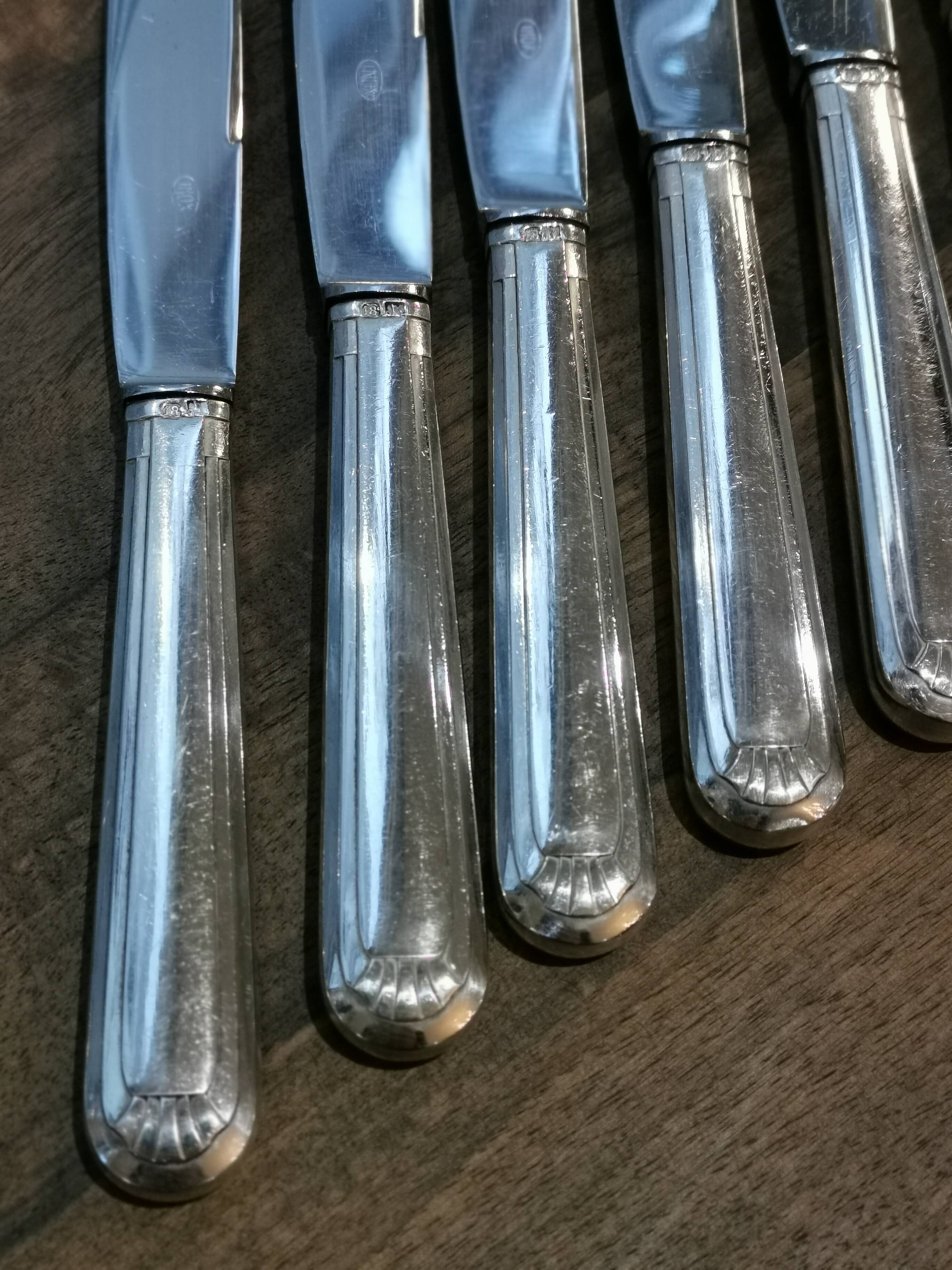 6 large silver metal knives