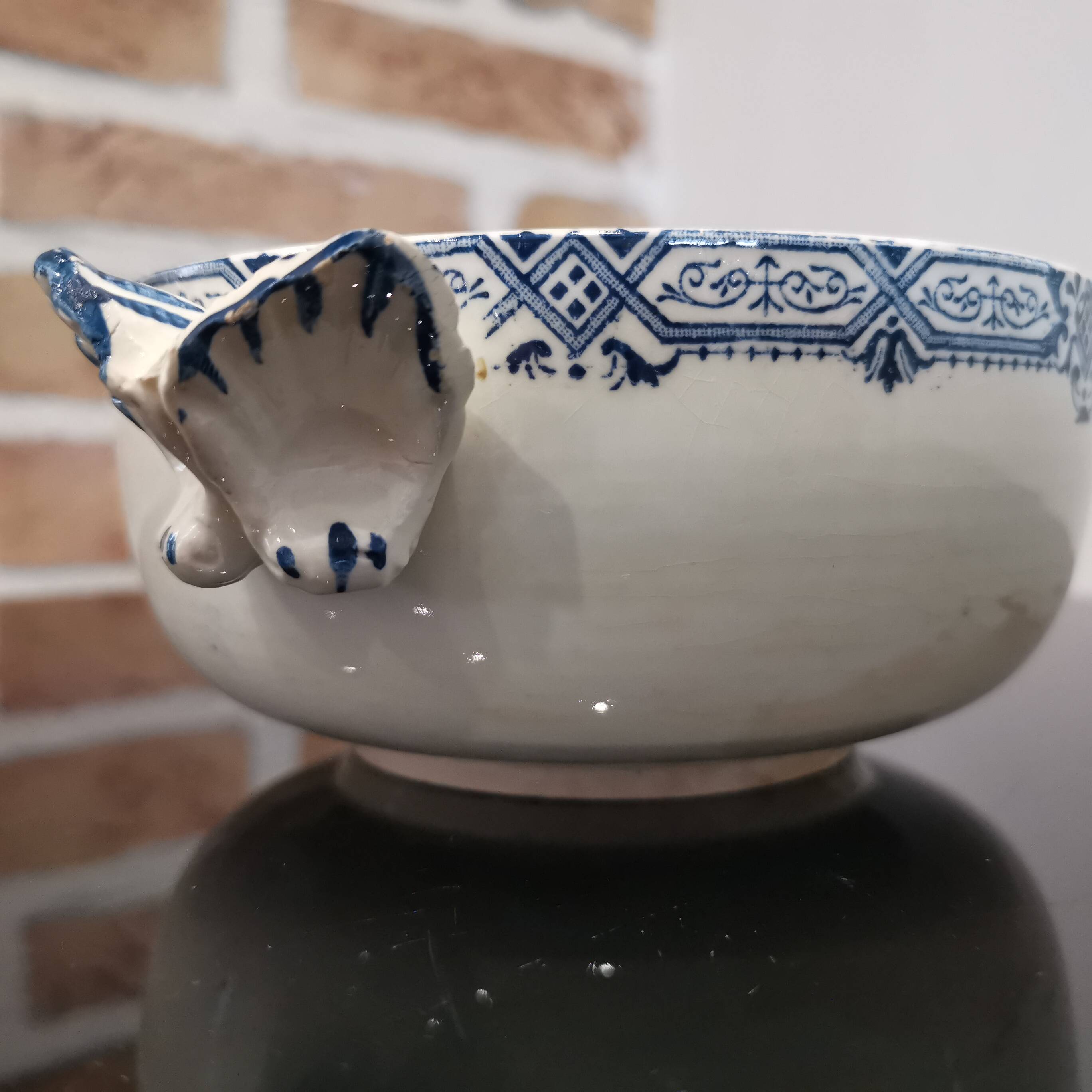 Butterfly ear bowl in iron clay with blue patterns