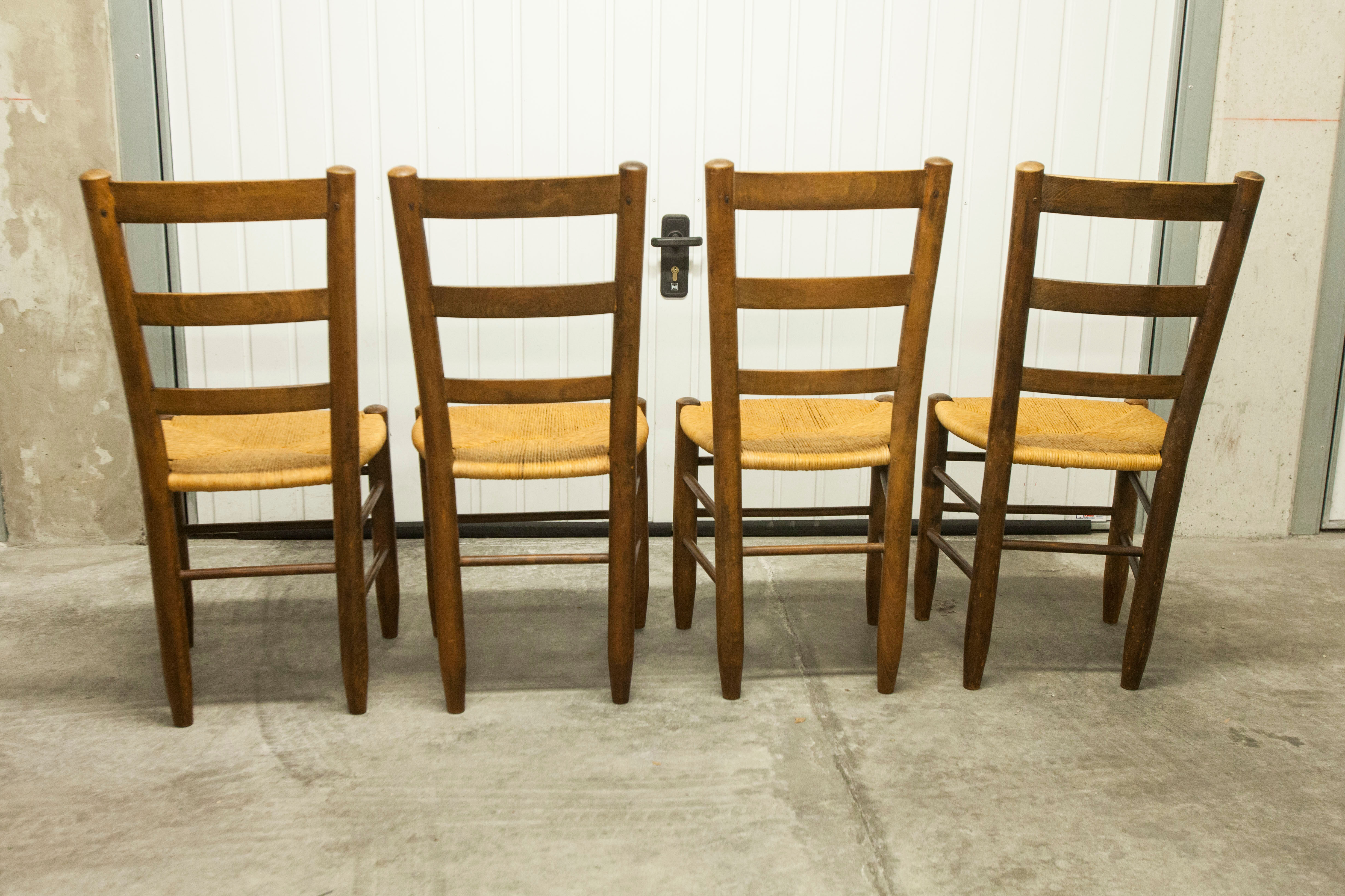 Lot de 4 chaises bois et paille 1950 chêne massif et assise paillée