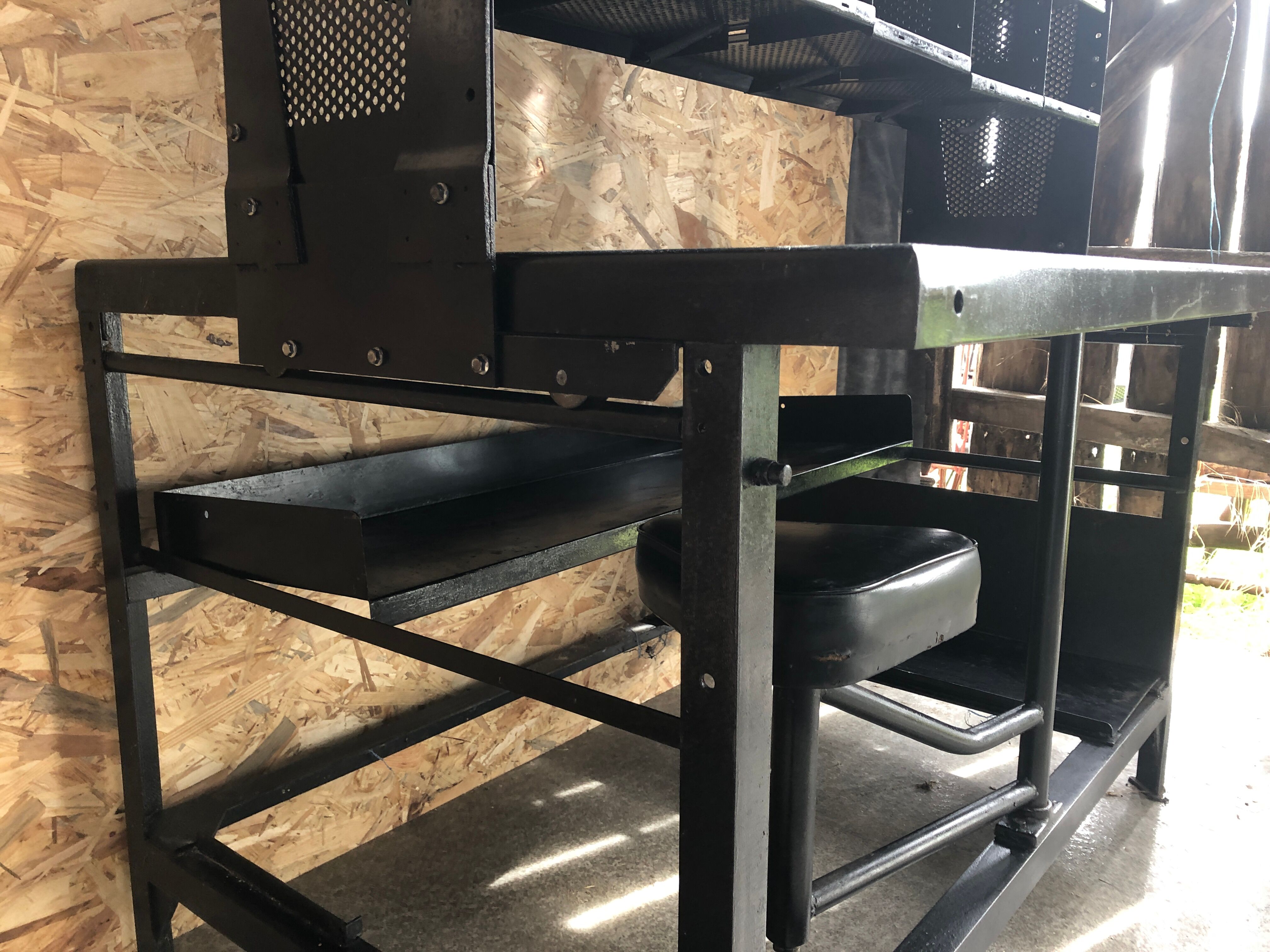 Old black metal postal sorting furniture + 30 perforated lockers + vintage stool