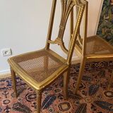 Pair of Louis XVI style fluted gilded chairs
