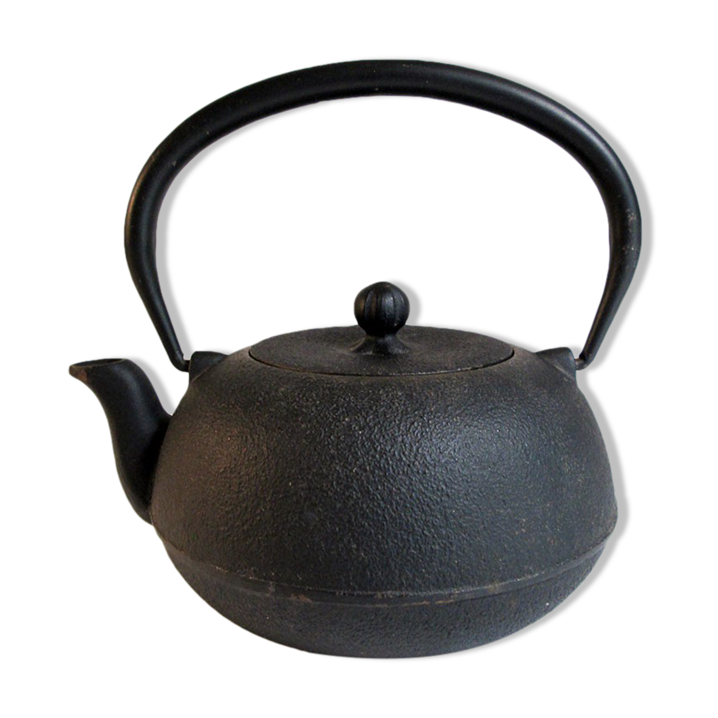 Black cast iron teapot