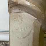 Plaster bust, young girl, monogram and date.
