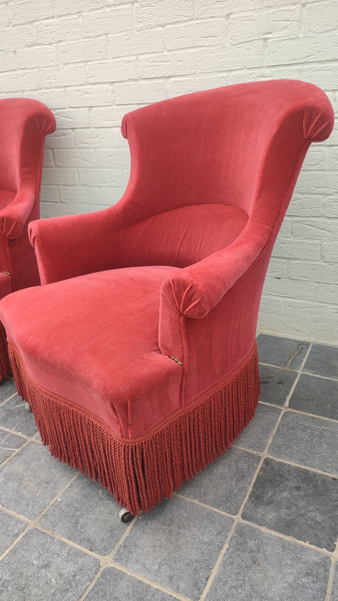 Pair of fringed crapaud armchairs