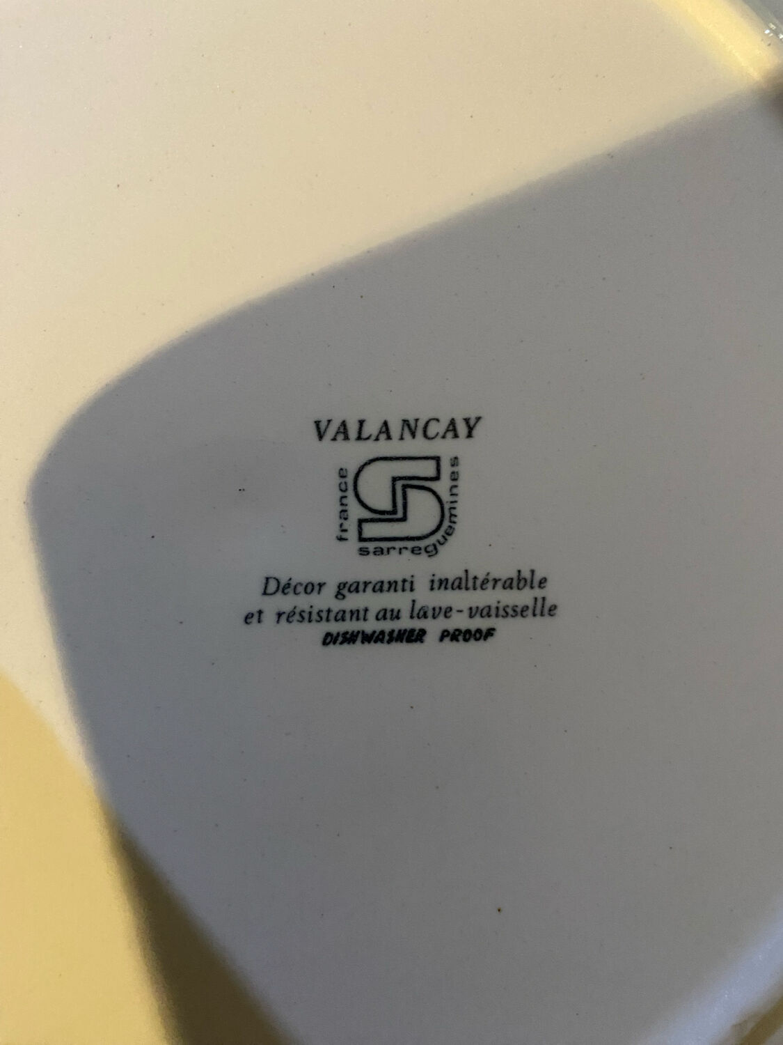 Many vintage flat plates from Sarreguemines.