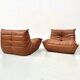 Togo lounge chairs in cognac cow leather attributed to Michel Ducaroy for Ligne Roset, set of 2