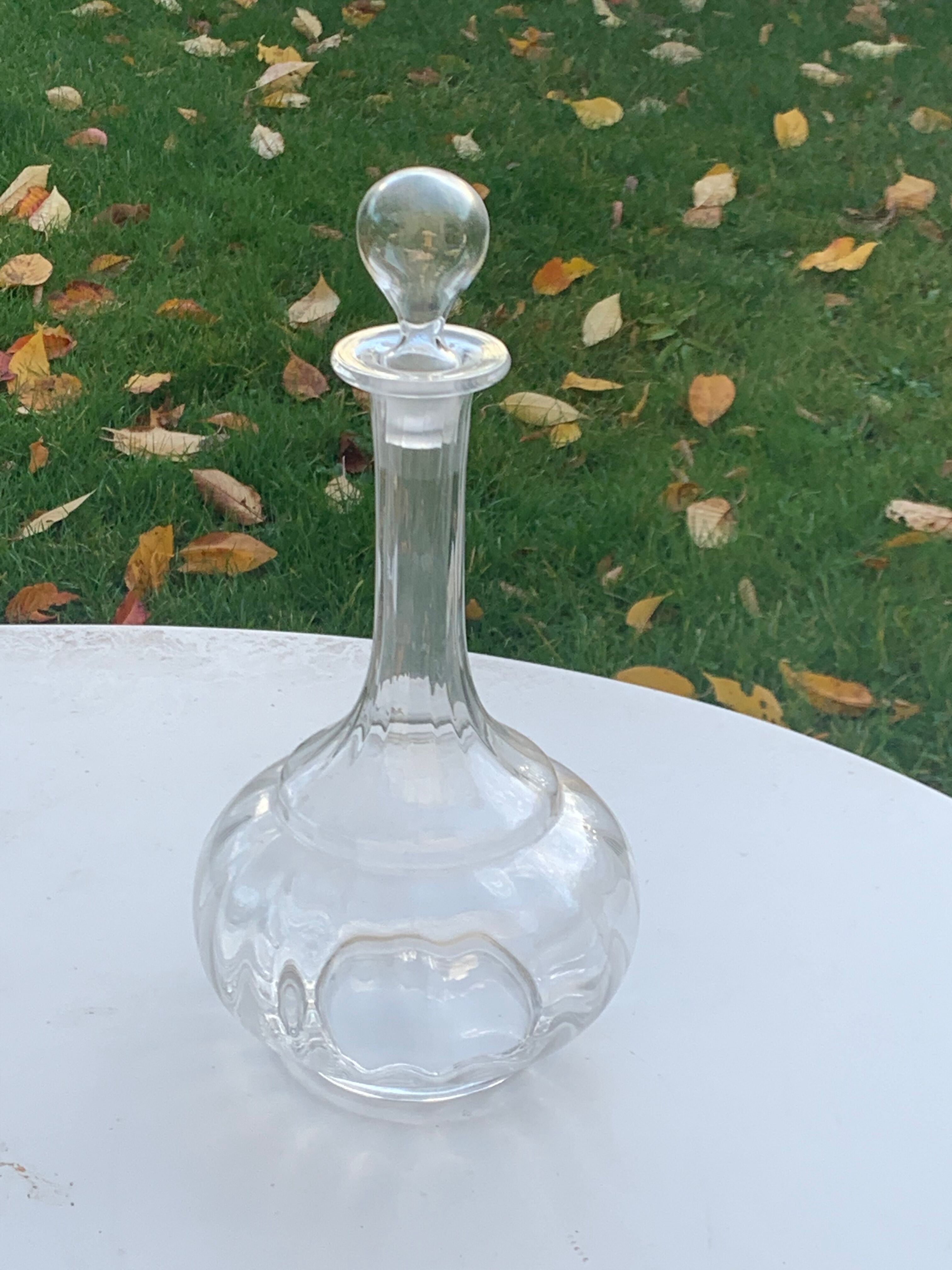 Elegant and vintage transparent glass wine decanter