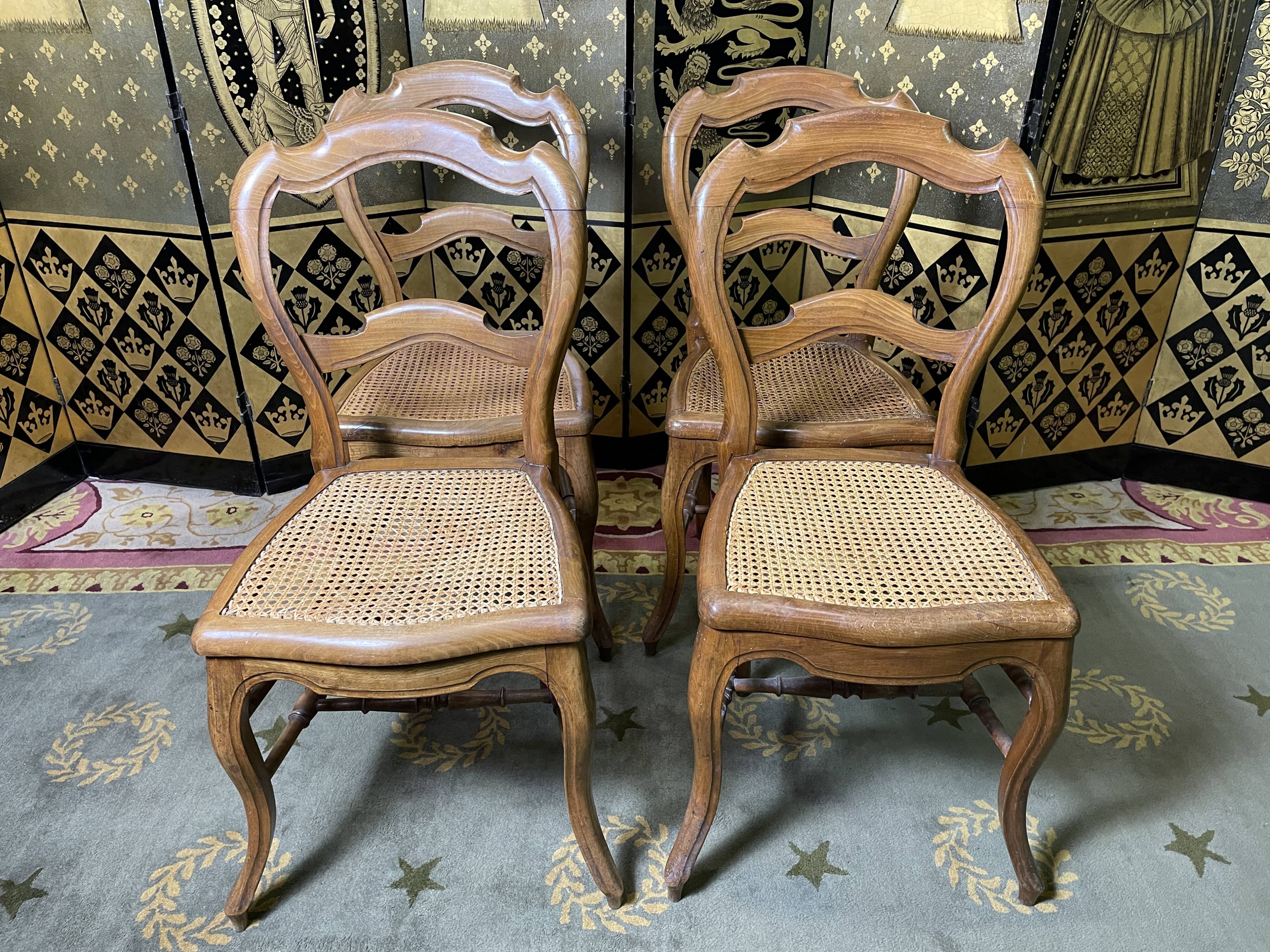 Suite de 4 chaises Louis Philippe en cannage