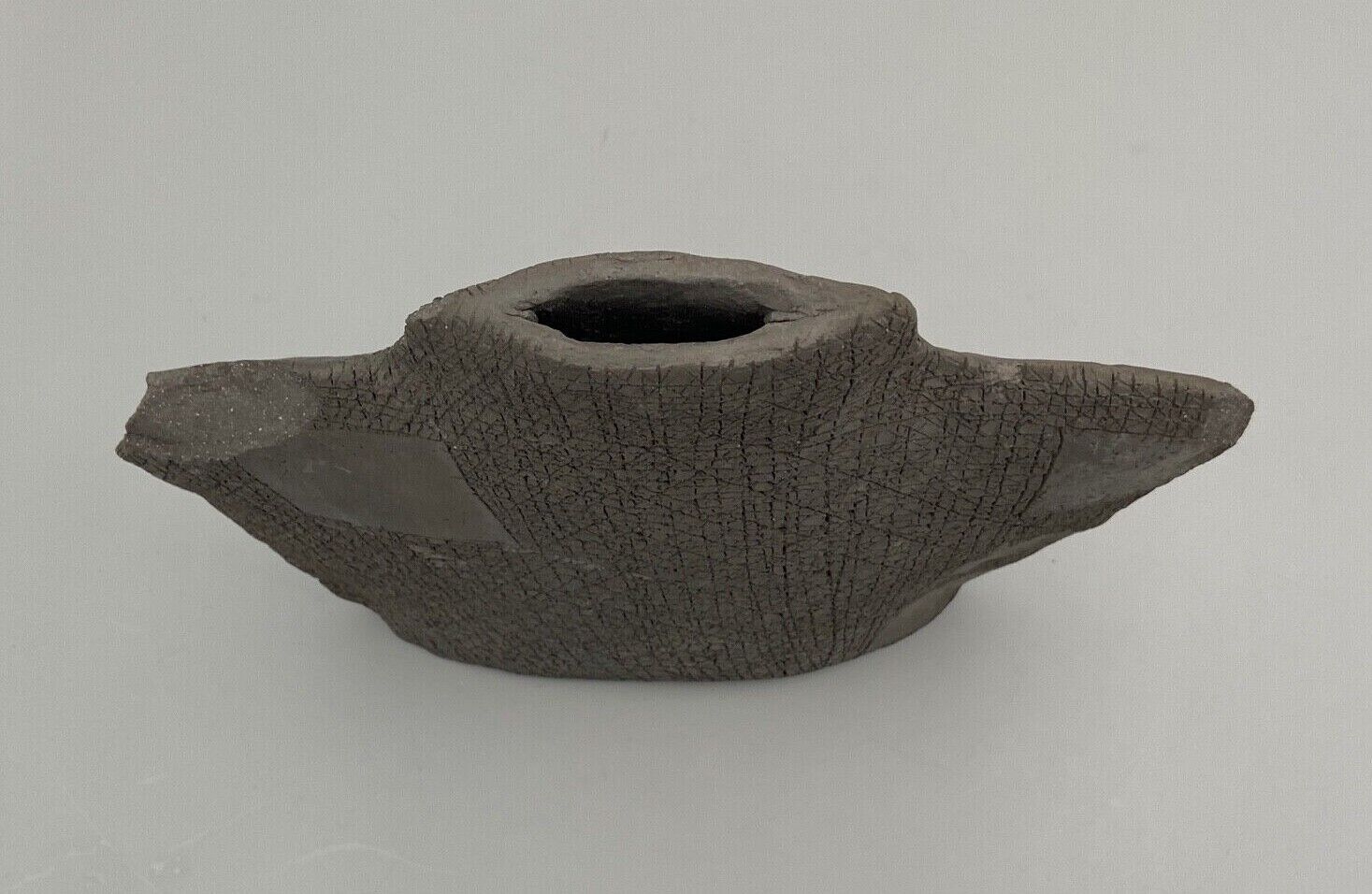 Earth vase by clement fond noir 1980