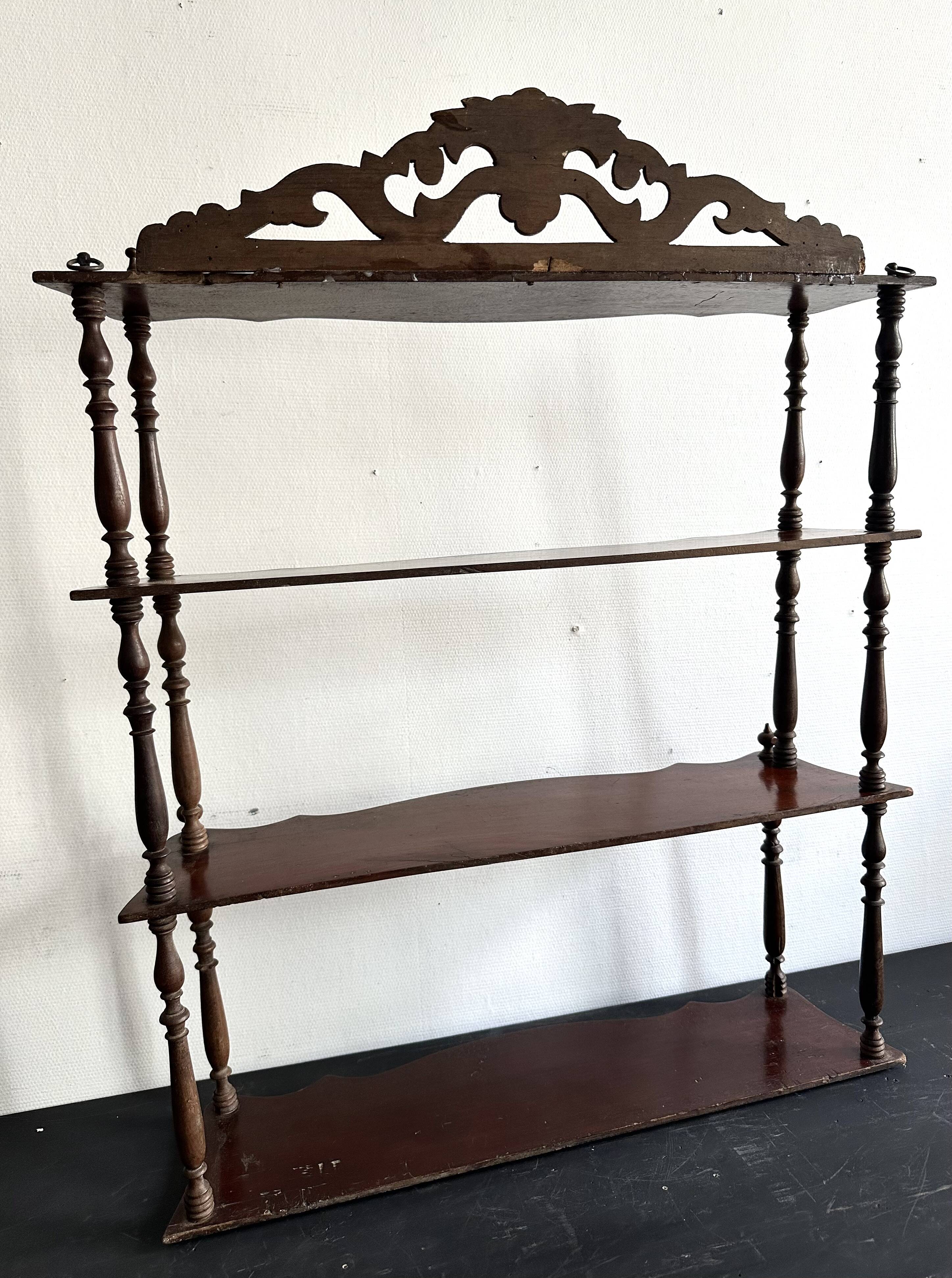 Large Napoleon III shelf in turned wood with a pediment.