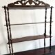 Large Napoleon III shelf in turned wood with a pediment.
