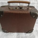 Old metal cardboard suitcase