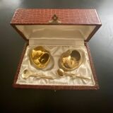 2 Snail-shaped salt pots in gold-colored porcelain