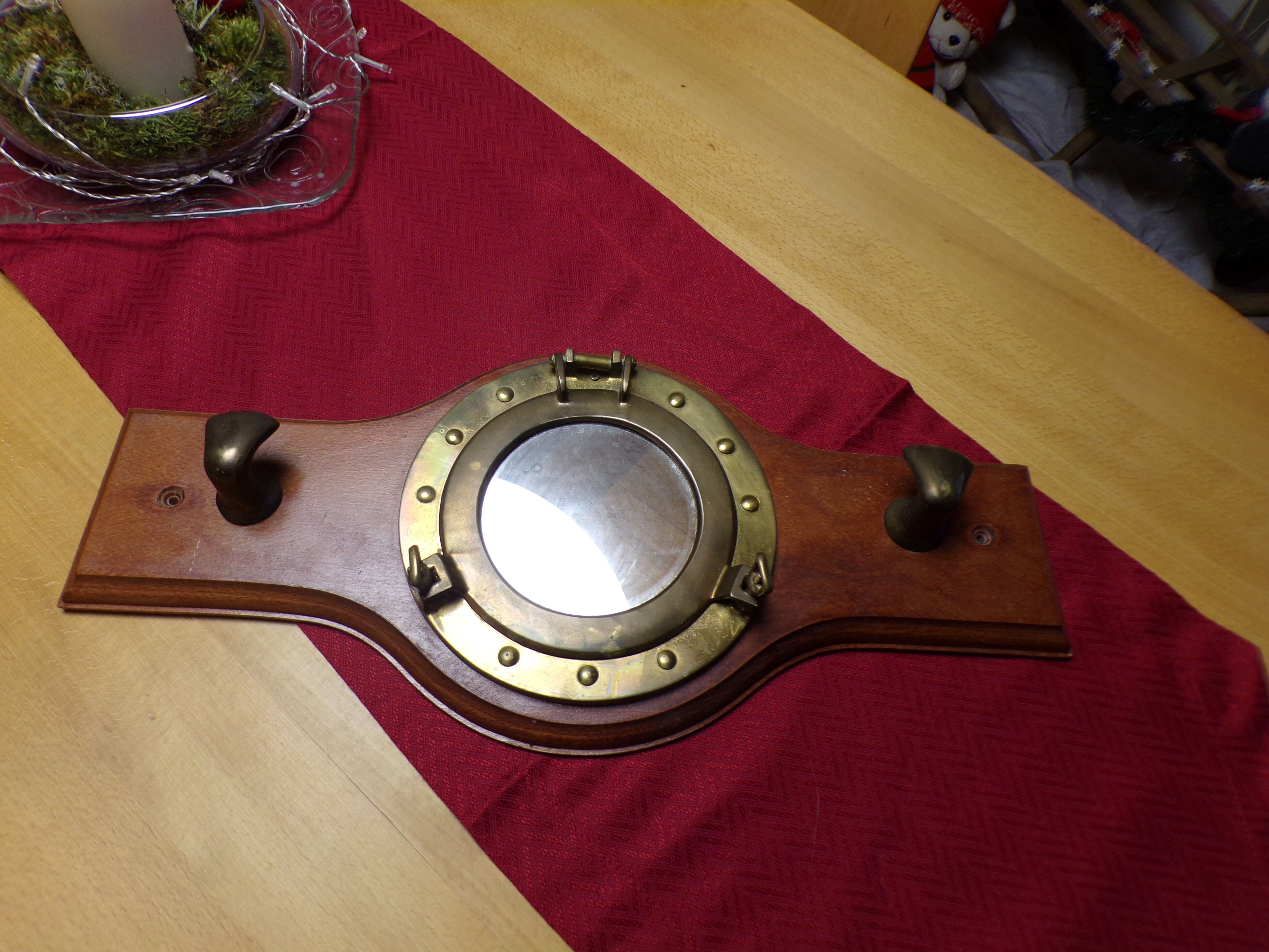 Marine style coat rack with porthole mirror