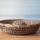 Old wicker basket, straw and bramble, woven basket, countryside, chalet, kitchen, interior decoration.