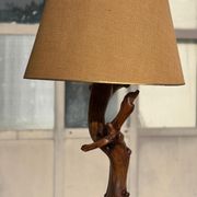 Floor lamp in solid olive wood, Brutalist style, French work from the 1970s.