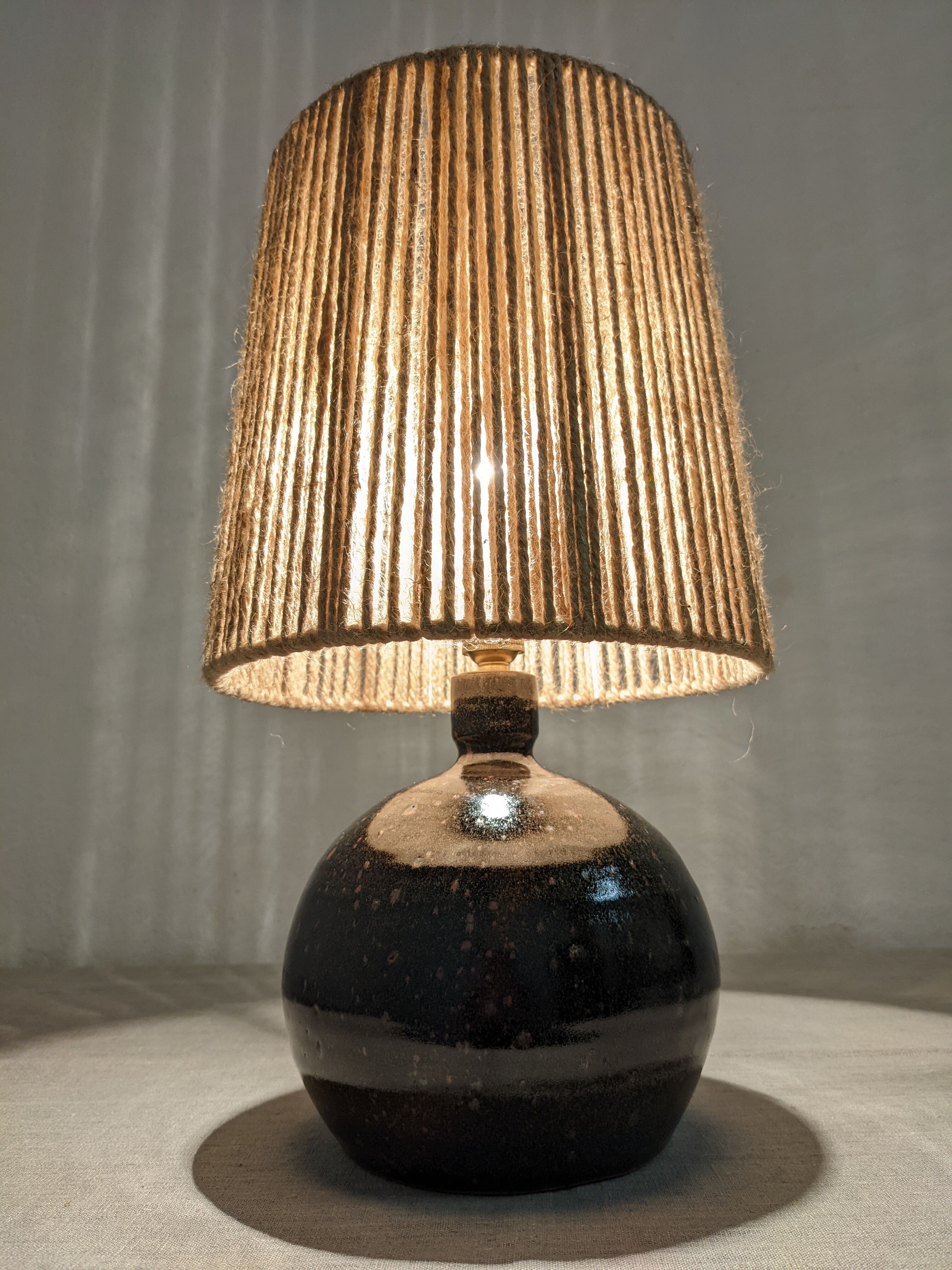 Vintage varnished stoneware lamp and jute rope