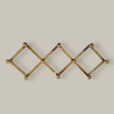 Brass accordion coat rack