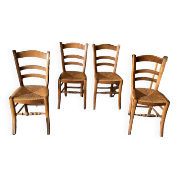 Four old straw chairs