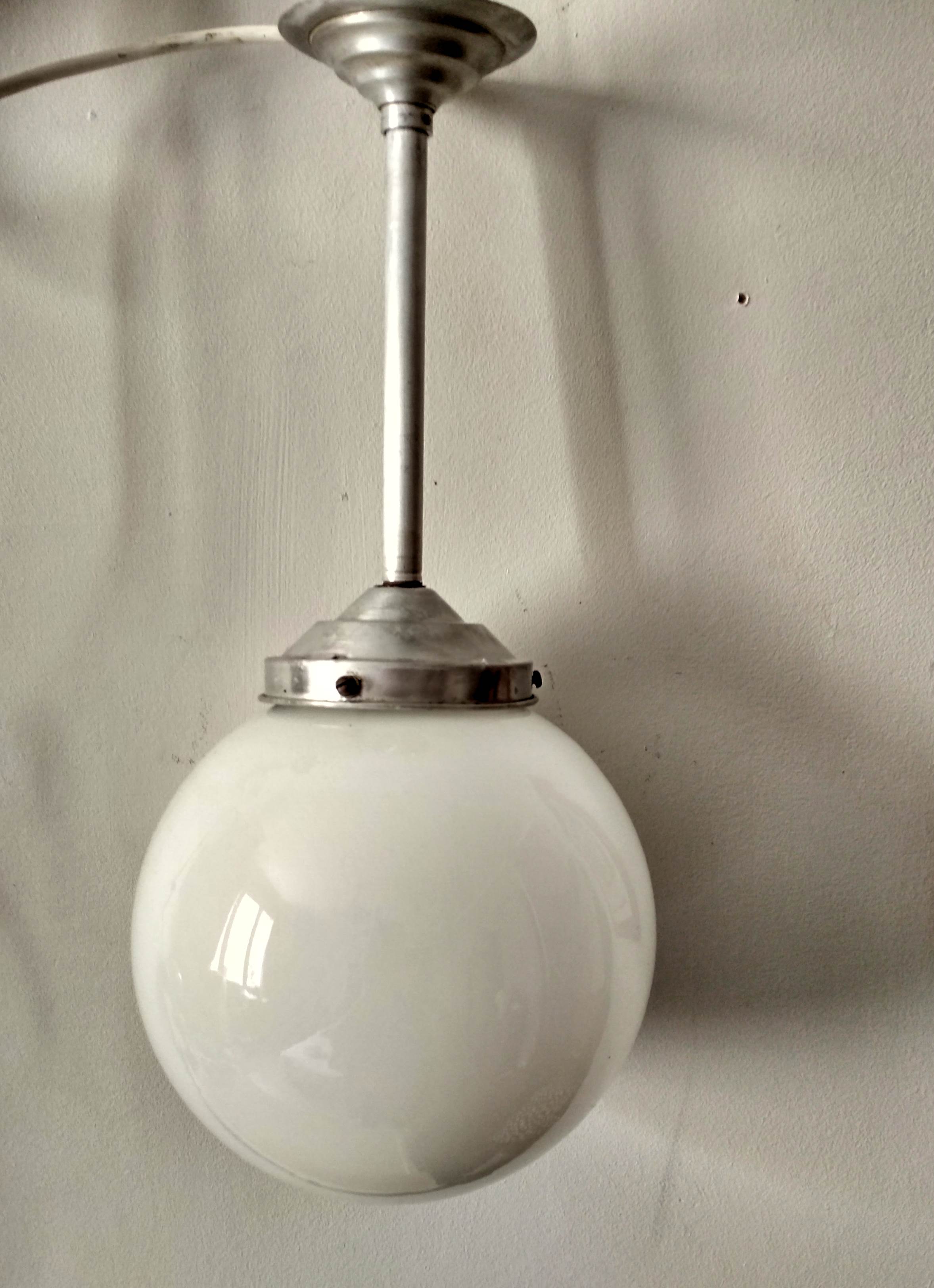 White opaline globe suspension on stem and aluminum metal structure