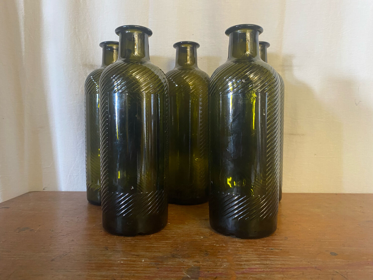Set of 5 antique carapelli bottles, smoked and ribbed vintage glass