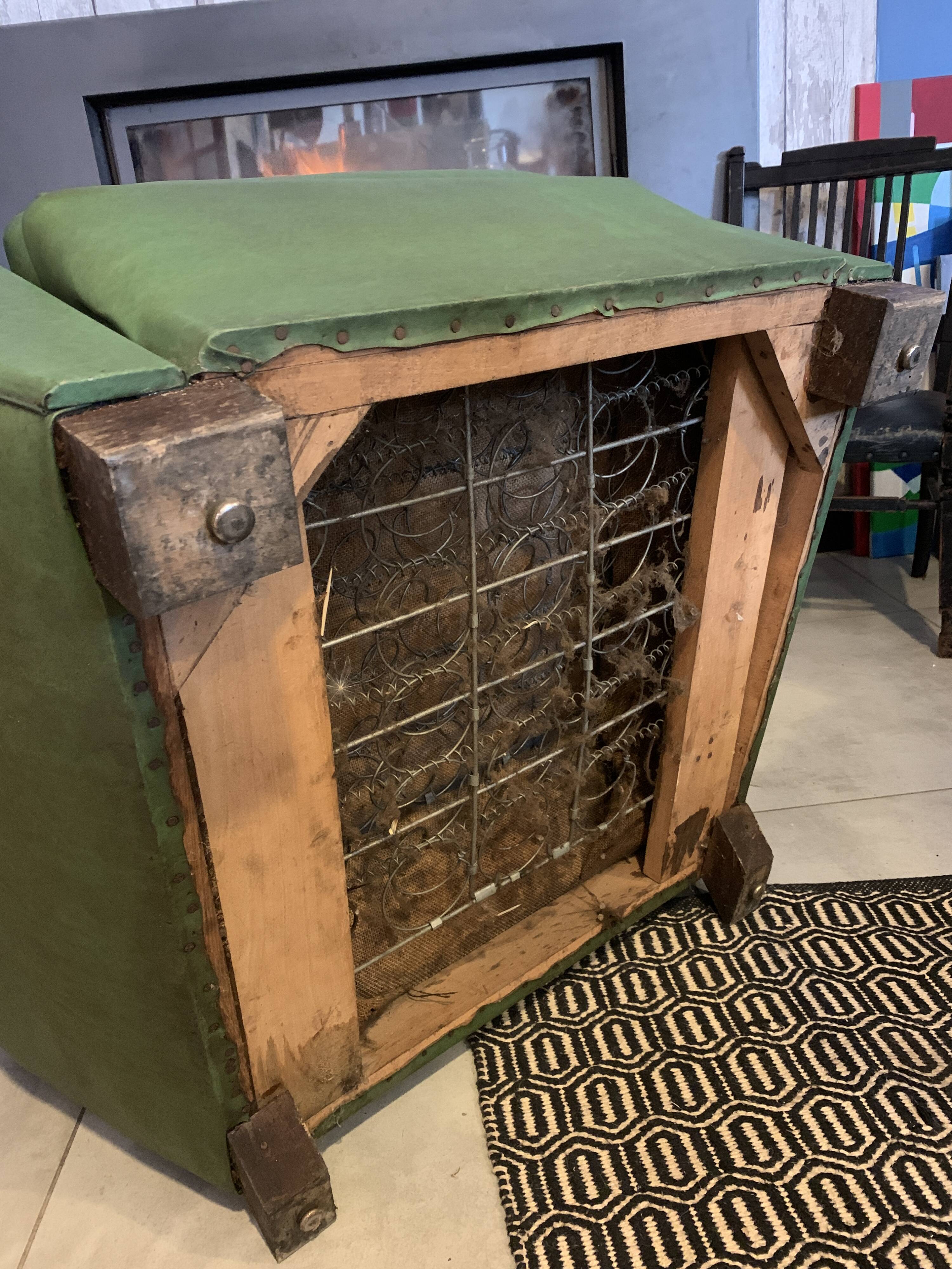 Pair of mustache club armcairs in green skai