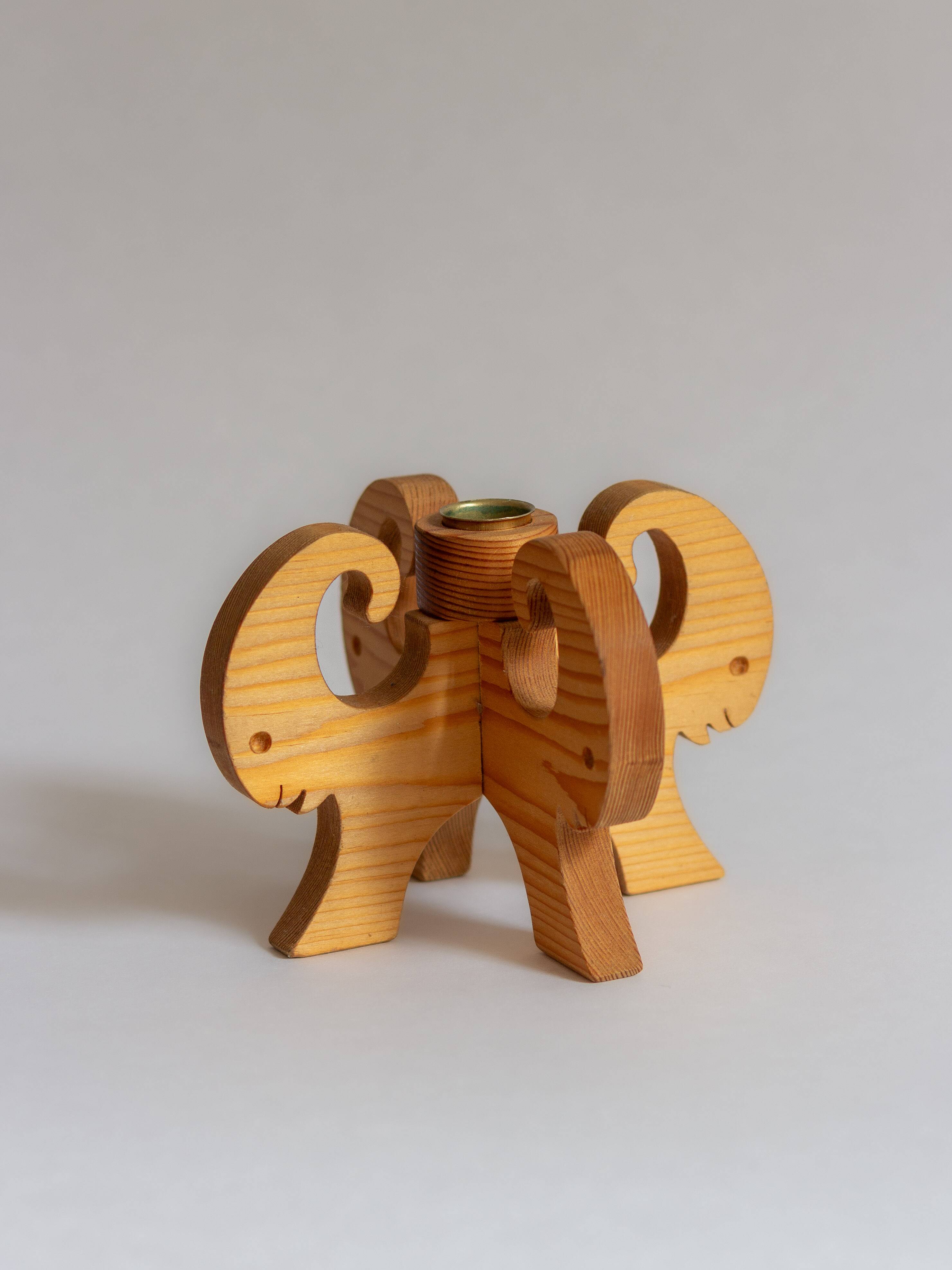 Wooden Christmas candle holder with four goat heads, Sweden, 1970s