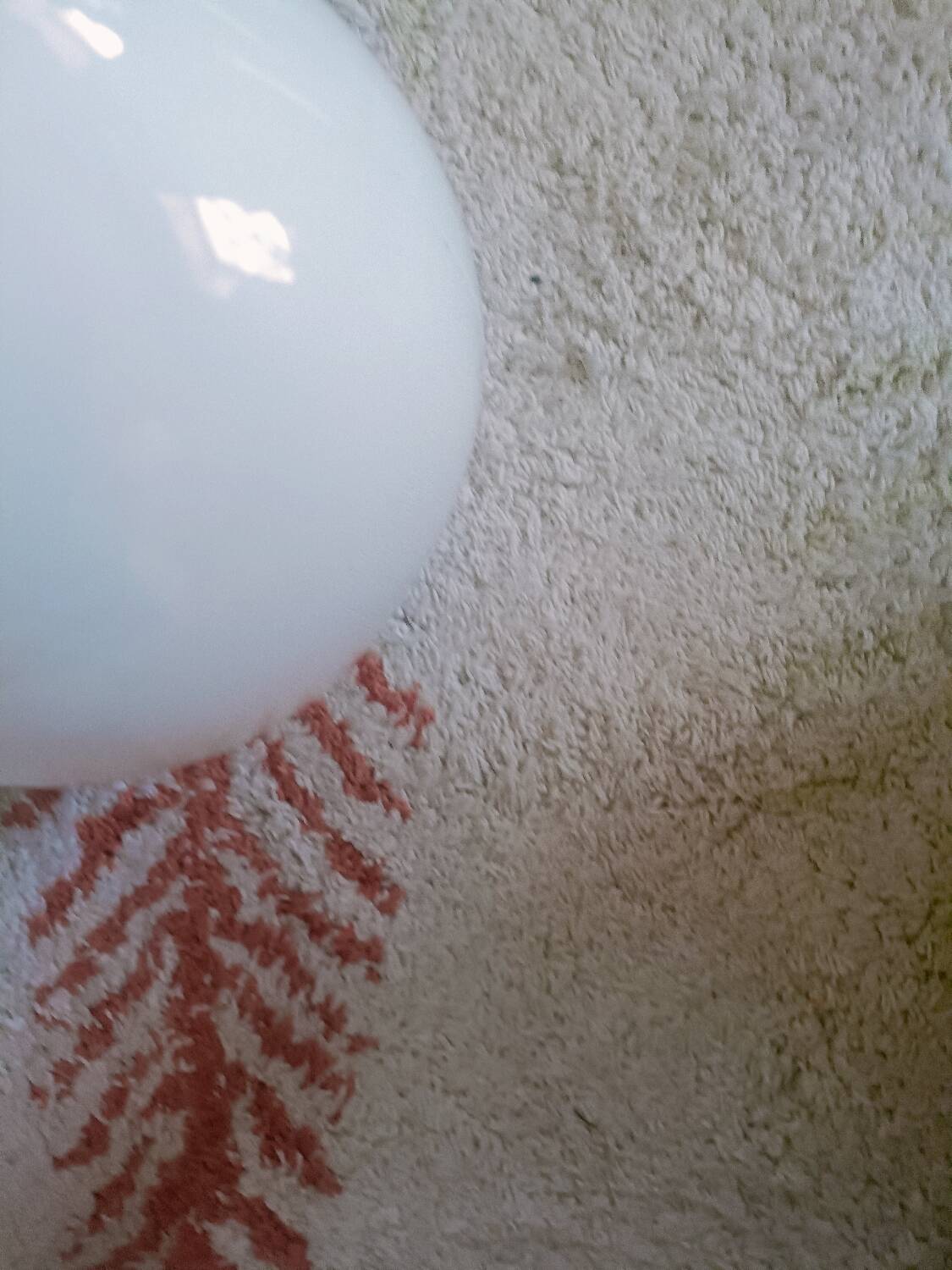 Two opaline glass globe wall lights