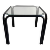 Vintage square black side table with a glass top