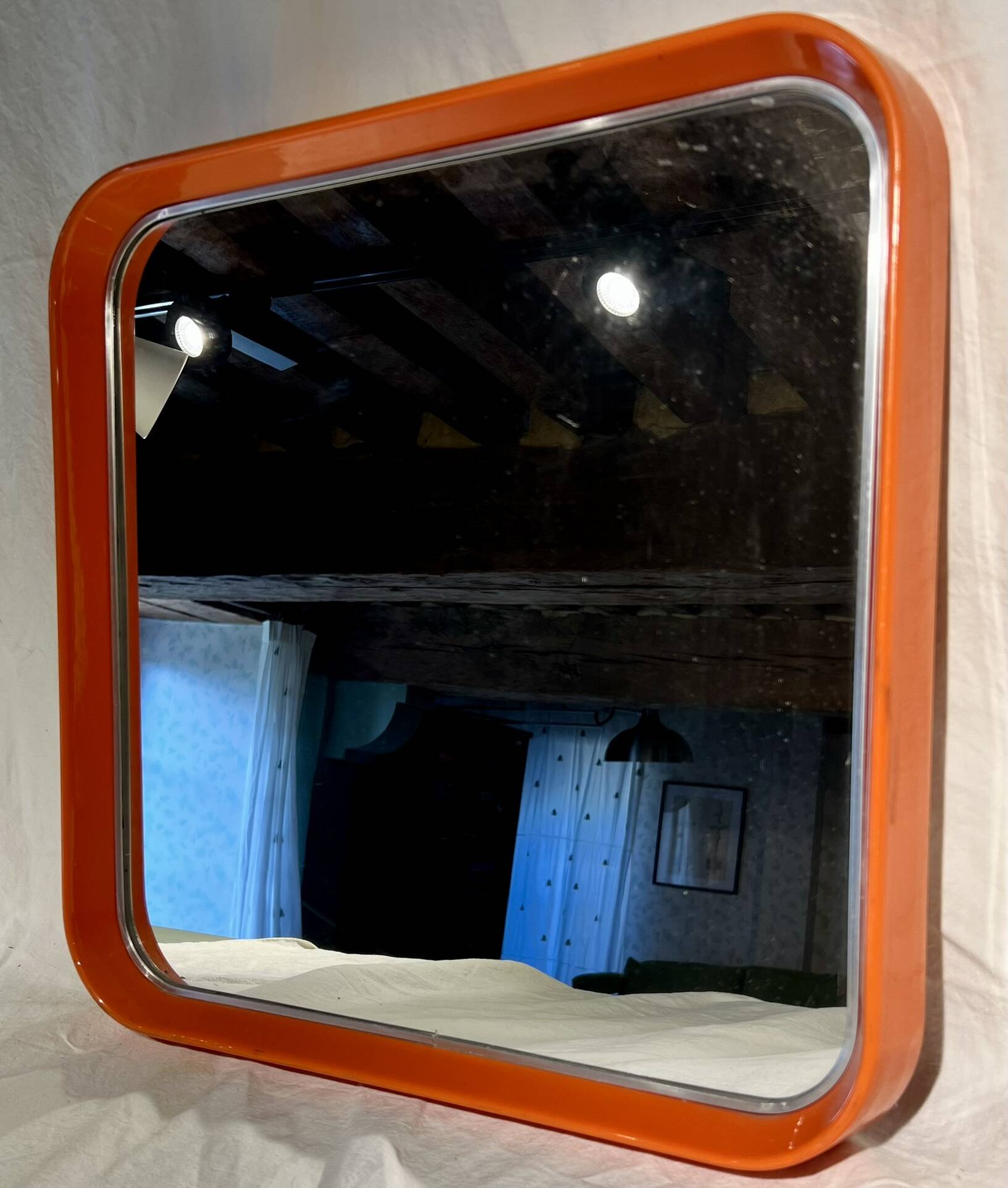 Square thermoformed mirror in orange plastic from SALC