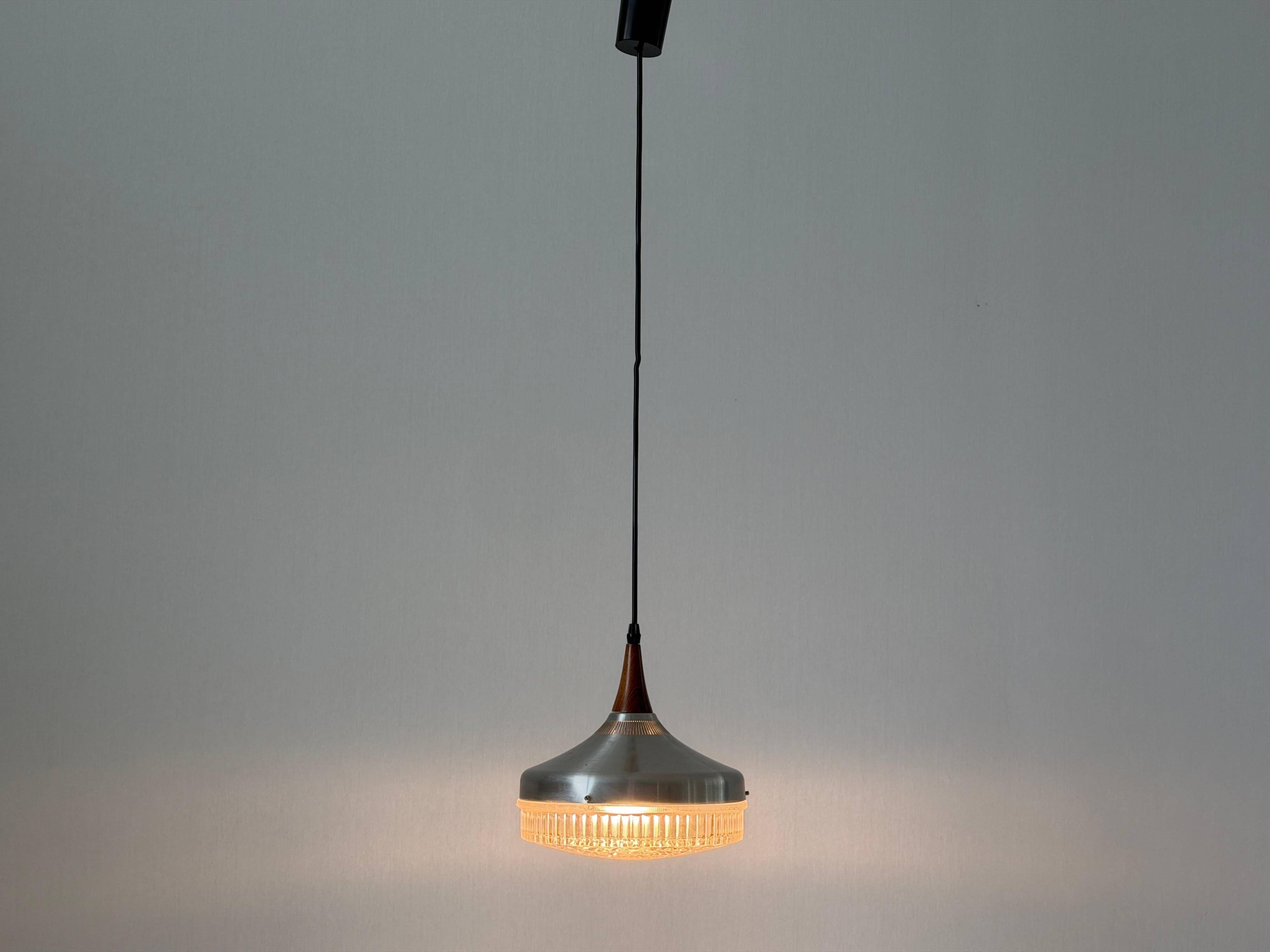 Crystal glass ceiling light with a metal frame and wood details, 1960s, Germany.