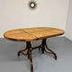 Vintage dining table with a cane top by Mundus from the 1970s.