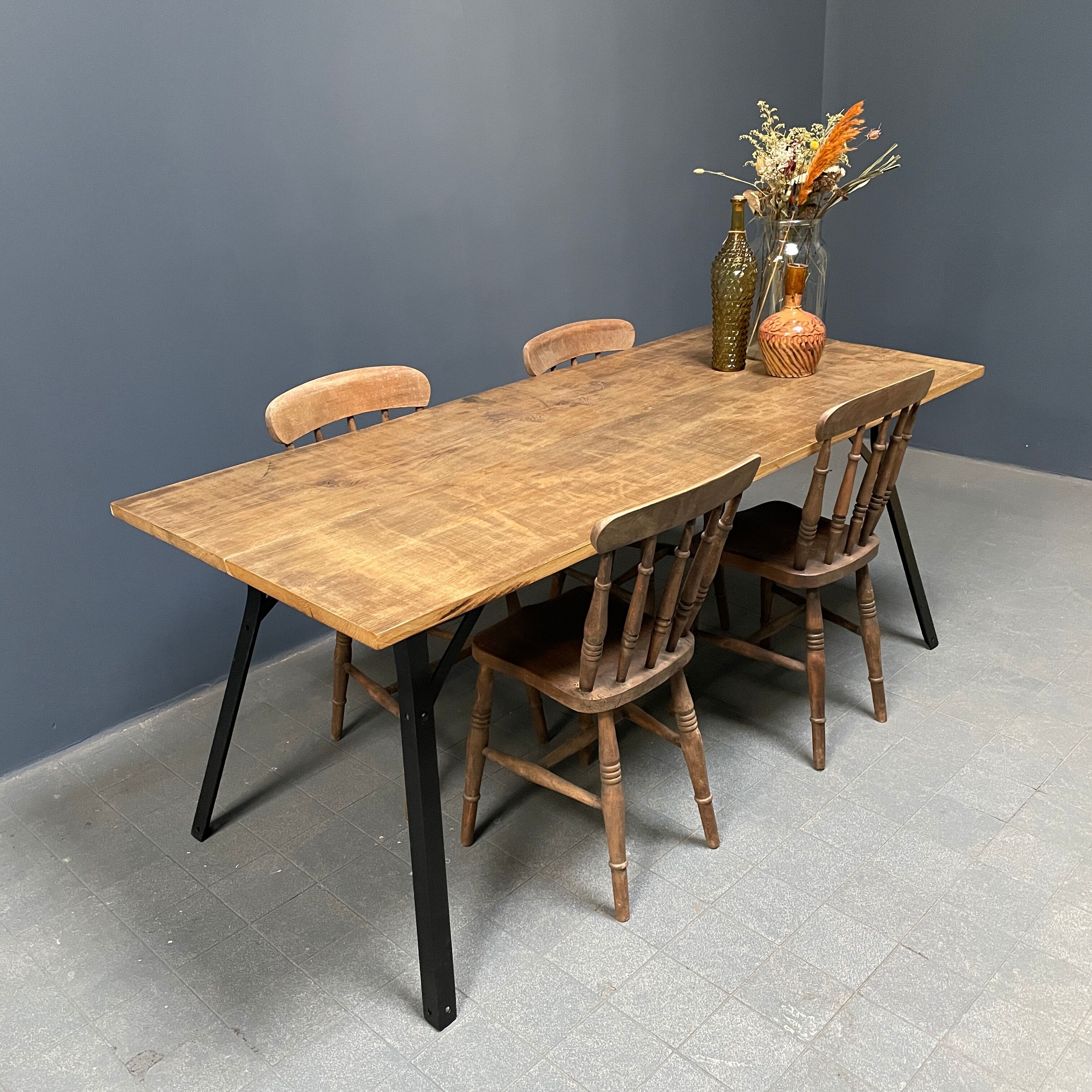Handmade industrial oak dining table with black metal legs