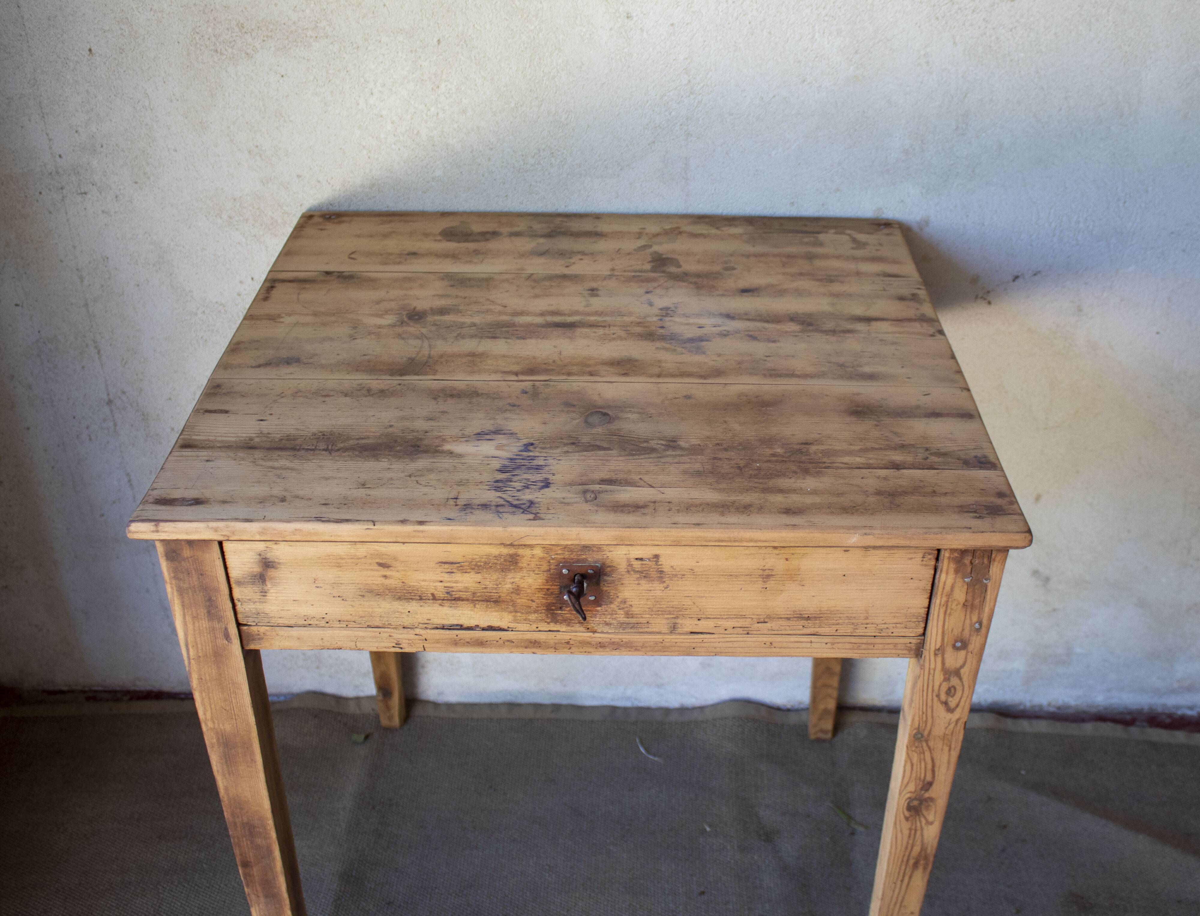 Small vintage desk made of solid wood.