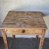 Small vintage desk made of solid wood.