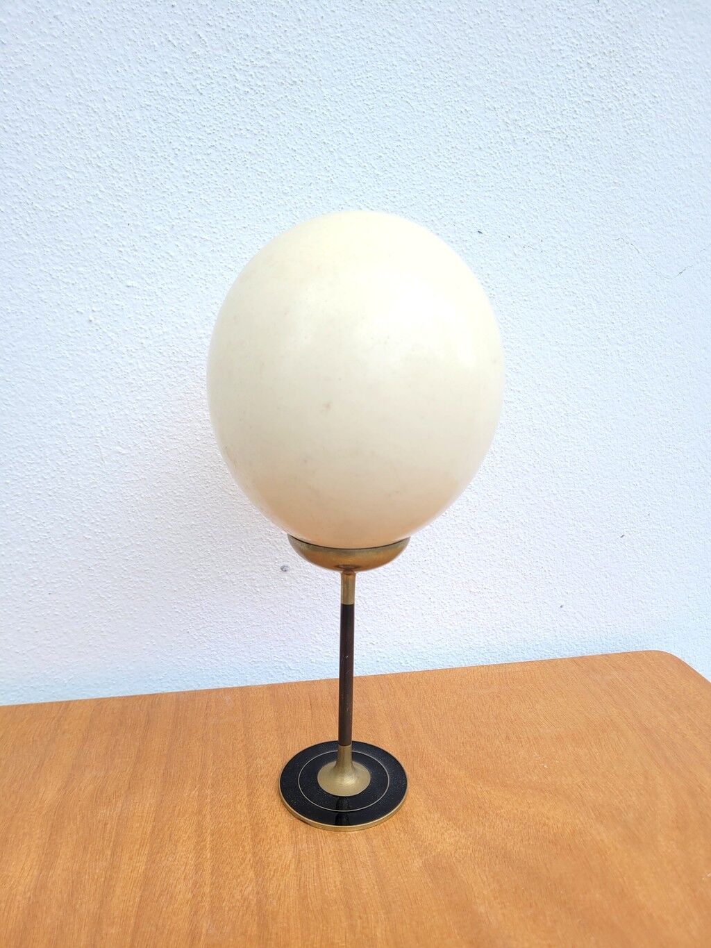 Ostrich egg on a brass stand