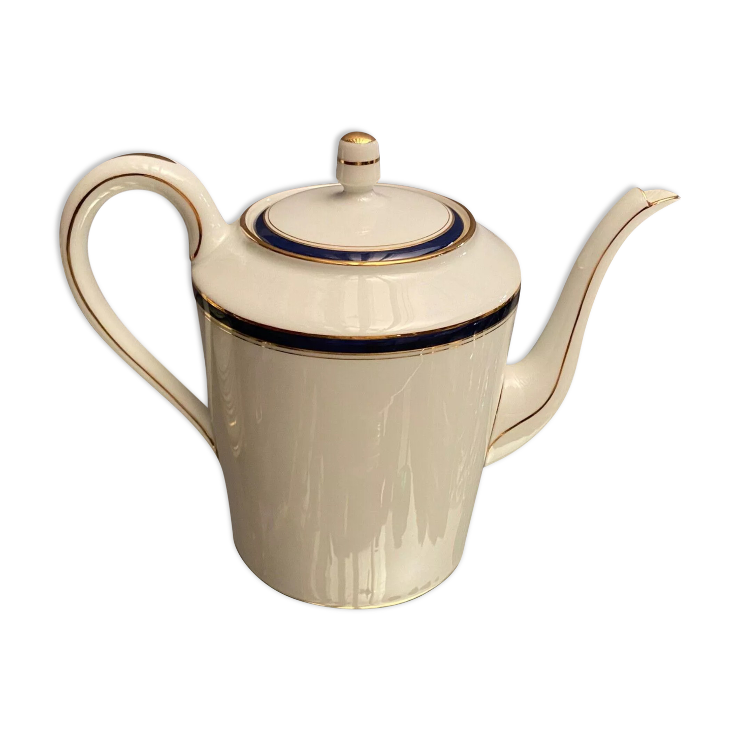 Teapot with blue and gold nets in Limoges porcelain signed Haviland