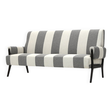 Three-seater wooden sofa, 1950s.