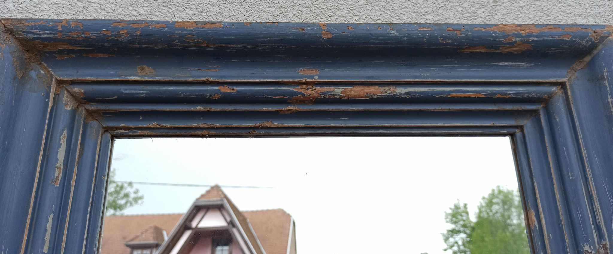 Old blue wooden mirror