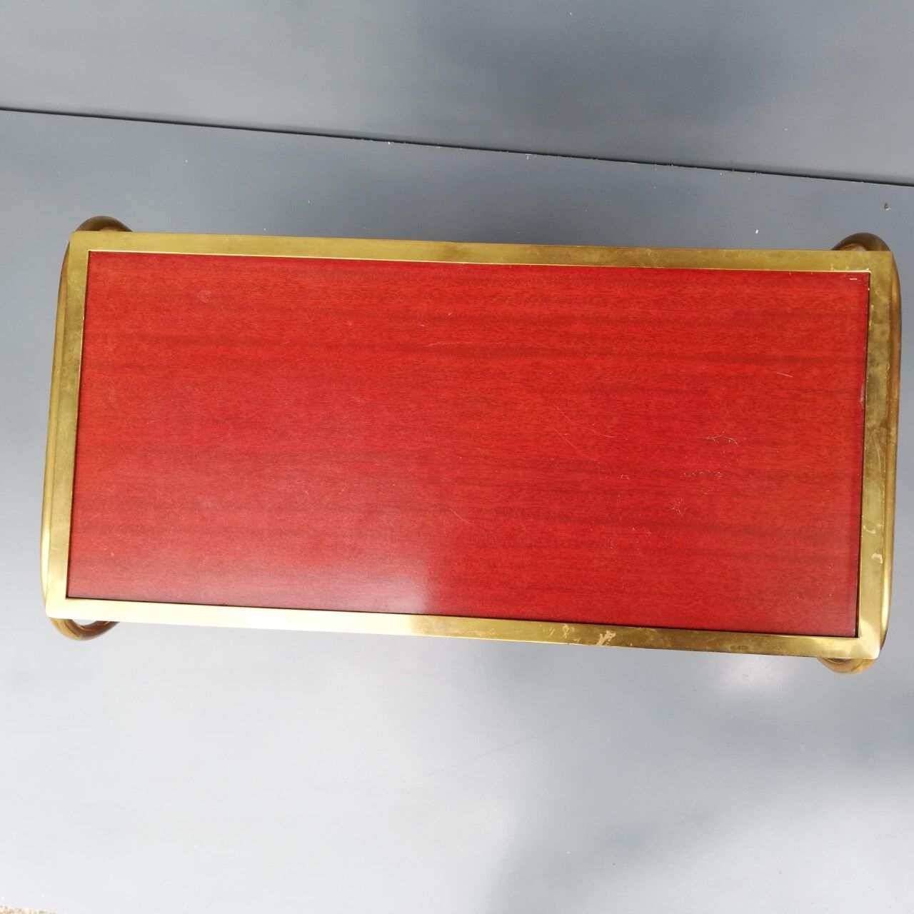 Brass side table with vintage magazine rack