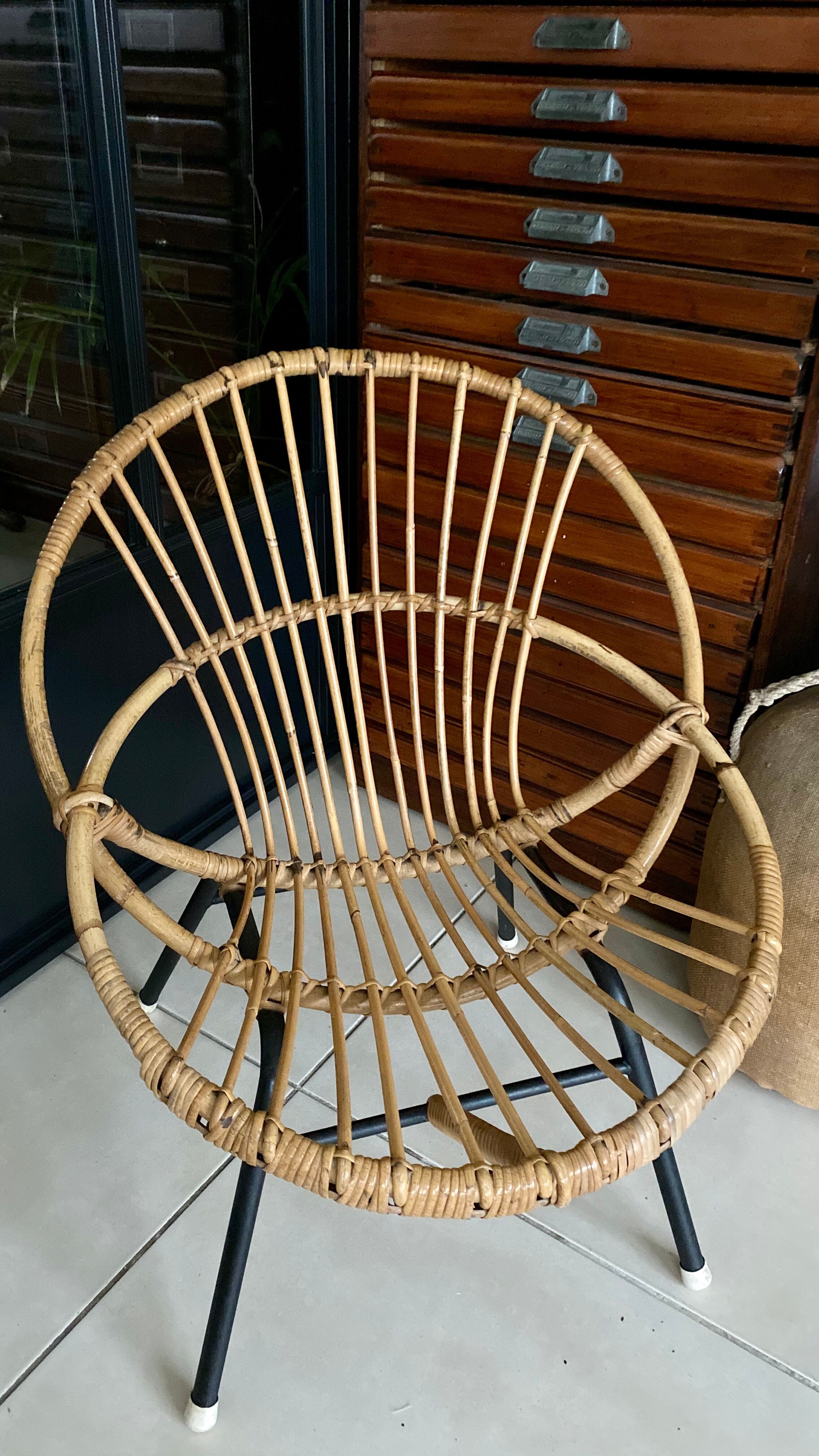 Old vintage metal foot rattan chair