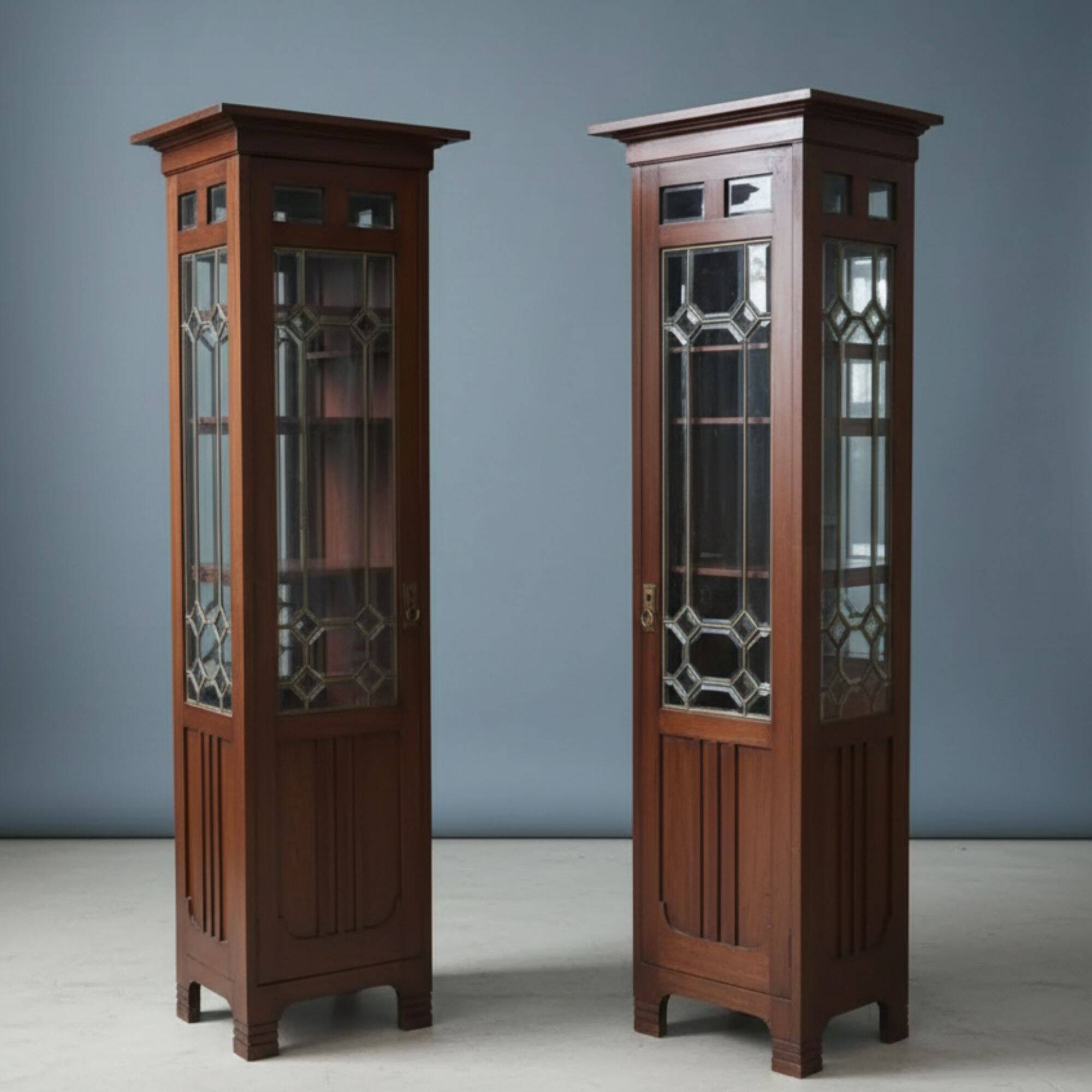 Pair of Art Nouveau solid wood showcases, Central Europe, circa 1910