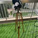 Floor lamp in the style of a cinema projector.