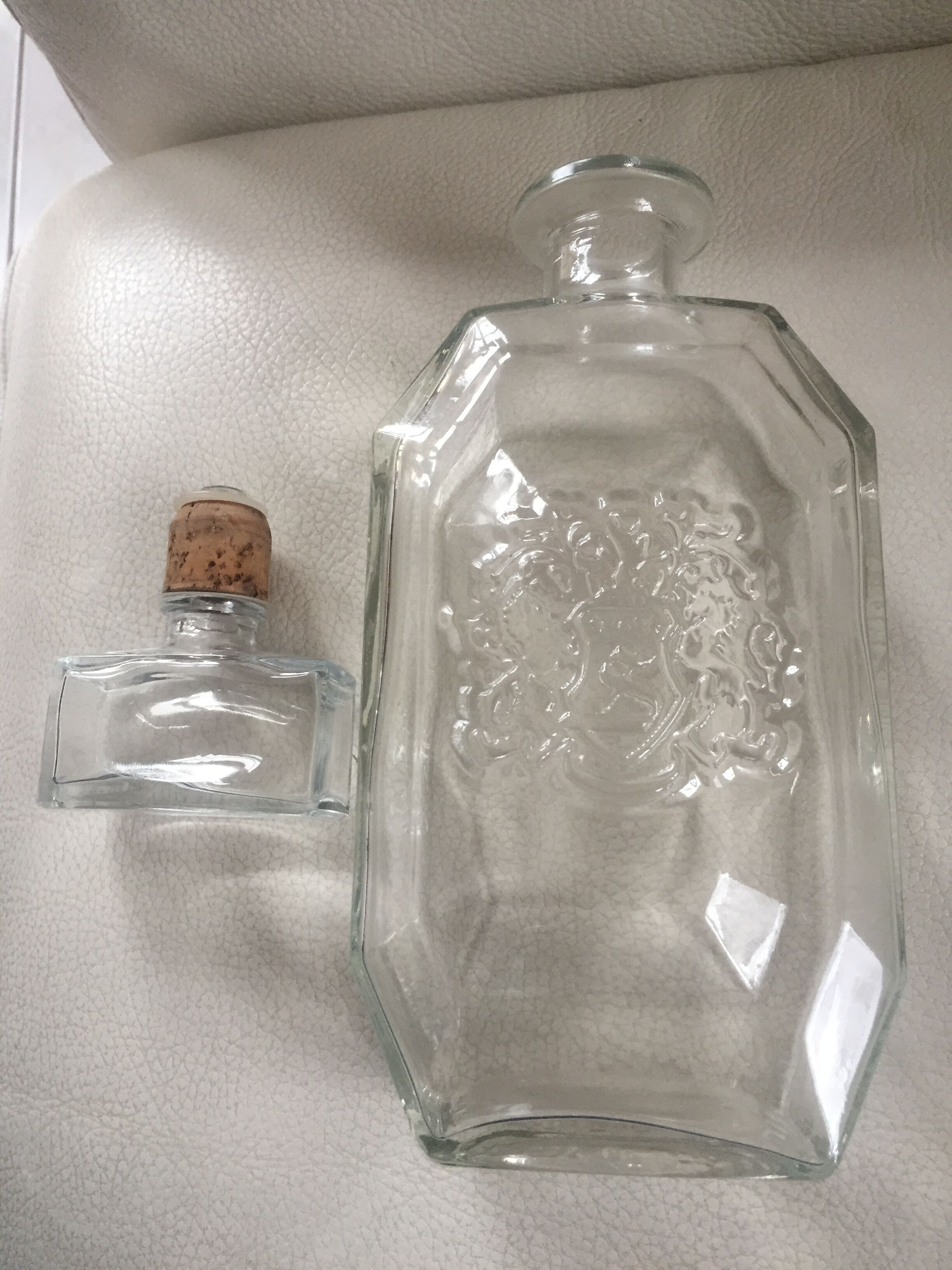 Glass bottle with coat of arms