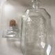 Glass bottle with coat of arms