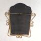 Vintage faceted mirror in a brass frame, 1950s.