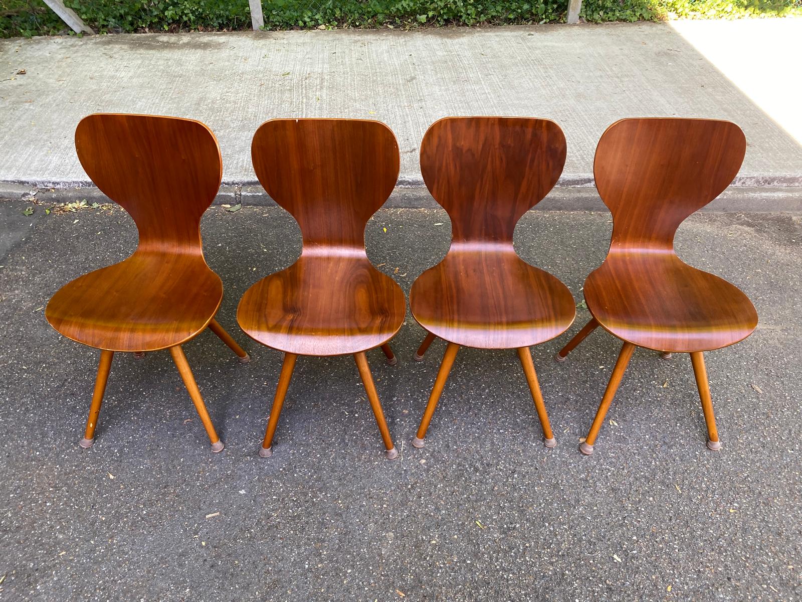 4 vintage Scandinavian dining chairs in curved walnut.