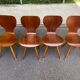 4 vintage Scandinavian dining chairs in curved walnut.